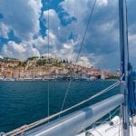 view of a sailing boat and town views of the city