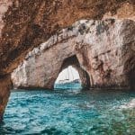 a sailing boat through the coves in Zakynthos