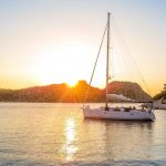 sailing boat at sunset in Greece