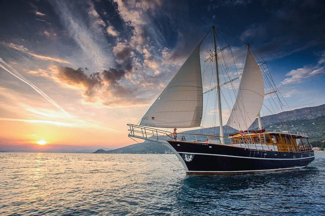 image of the altair master charter under sail